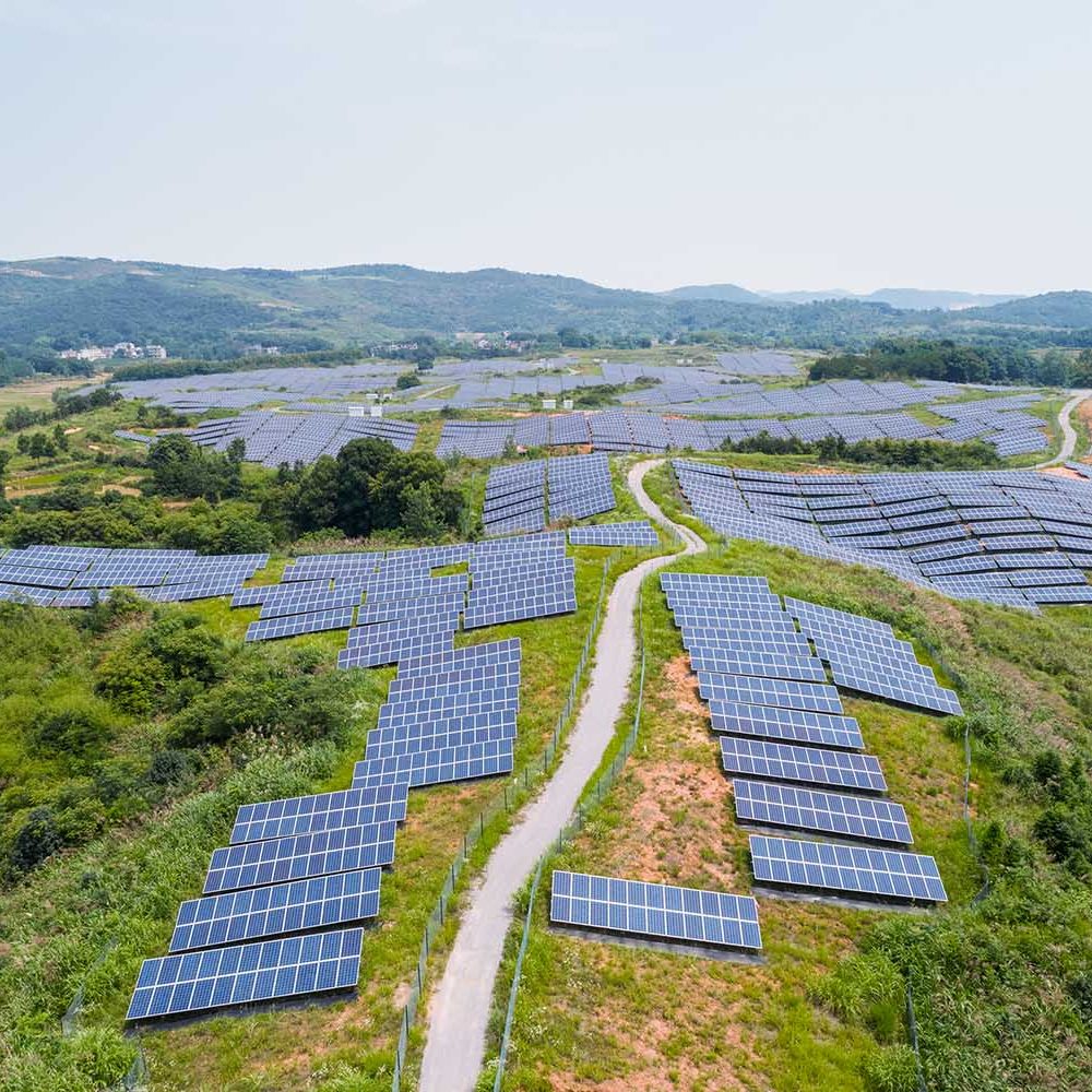 aerial-view-of-hillside-solar-energy-AXP84HC.jpg